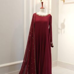 Exquisite chiffon ensemble showcasing intricate handwork details including kora, dabka, Swarovski crystals, and sequins on the maxi and dupatta, embodying elegance and craftsmanship.