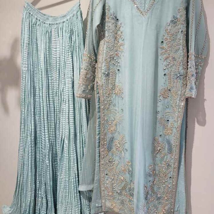 Sophisticated ensemble with bamber organza shirt, vaiscos silk dhaka, and pure organza dupatta. Handwork detailing: kora, dabka, pearls, Swarovski crystals, gems, sequins